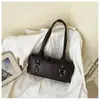 Bolso de mano Boston de cuero plisado de alta gama inspirado en el estilo ins coreano transfronterizo, nuevo para mujer, con hebilla metálica vintage