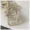 Bolso de Hombro de Mezclilla Arrugado Estilo Coreano 2026 Nuevo Bolso de Hombro Único con Lazo de Nicho Bolso de Mano Versátil para el Trabajo