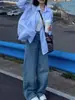 Camisa Listrada Azul Estilo Francês para Mulheres 2025 Nova Versão Coreana Petite Solta Preguiçosa Proteção Solar Top
