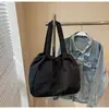 Bolsa tote de gran capacidad para mujer 2026 nueva moda bolsa tote versátil ligera casual para estudiante bolsa escolar bolsa de compras