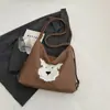 Bolsa de Verão 2025 Grande Capacidade Couro Macio Bolsa de Ombro Feminina Nova Mochila de Urso de Pelúcia Bolsa de Mão Bolsa Feminina