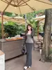 Elegante y chic conjunto de tres piezas para mujer: Cárdigan de manga larga, top tipo camisola y falda midi de cintura alta, perfectos para otoño