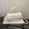 Bolso Cuadrado Pequeño de Mano con Textura Tendencia Transfronteriza Bolso de Mujer Otoño 2026 Nuevo Color Sólido Bolso de Hombro Simple Bolso Cruzado para el Trabajo