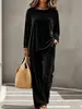 Ropa nueva de mujer transfronteriza europea y americana 2026, suéter casual de cuello redondo de manga larga, pantalones de longitud extendida, traje de mujer de terciopelo multicolor