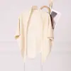 Chal de punto cruzado de mezcla de lana con lentejuelas de color sólido para mujer, bufanda cálida versátil para la columna cervical, venta al por mayor