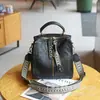 Bolsa de hombro cruzada de verano nuevo modelo de piel de oveja negra original hecha a mano estilo universitario retro simple casual mochila