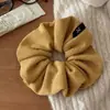 Novos Scrunchies de Pelúcia Outono e Inverno para Mulheres 2025 Novos Elásticos de Cabelo Estilosos e Modernos para Rabos de Cavalo