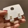 Nuevos pendientes populares de estilo coreano, simples y elegantes para niñas, pendientes de botón versátiles, simples y estilosos, accesorios para orejas de moda en TikTok al por mayor