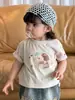 Conjunto de Verão Feminino Estilo Coreano, Duas Peças com Saia Jeans Curta Casual Leve Confortável Estampada de Desenho Animado, Novo Estilo