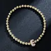 Pulsera elástica para mujer Amazon Transfronteriza Moda Letra Simple Cobre Incrustado con Circonita y Cuentas Uvccb