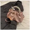 2026 Nueva Moda Femenina de Nicho Bolso de Nube Plisado Simple Bolso de Hombro Cruzado Elegante