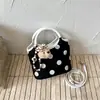 Bolso de Lunares para Mujer 2026 Nueva Moda de Verano Tendencia Bolso Cubo de Hombro Cruzado Único para el Trabajo y los Viajes