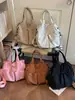 Bolso Tote Sencillo de Color Sólido para Viajes Diarios Mujer Otoño 2026 Nuevo Elegante Textura Individual Bolso Exquisito de Hombro Cruzado