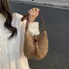 Bolso nuevo tejido de paja 2026, bolso de borlas estilo playa, bolso de mujer de inspiración étnica, venta al por mayor casual, bolso tejido hecho a mano, bolso de hombro, bolso cruzado