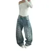 Jeans transfronterizos estilo americano inspirados en Napoleón para mujer, con un nuevo diseño con hebillas metálicas, un look único y elegante, y una silueta holgada, de pierna ancha y corte curvo.