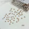Acessório de strass para nail art em zircônia chanfrada 5A triangular, popular online, strass para unha mini de fundo chato 3mm com design de laço