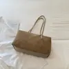 Bolso tipo almohada retro de gamuza de nicho estilo coreano, nuevo modelo otoño 2026, color liso moderno de gran capacidad para el día a día, para llevar debajo del brazo