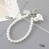 Pulsera de Cadena con Perlas de Flor de Cerezo Bicolor Estilo Coreano Ins Colgante para Teléfono Bolso Versátil de Moda Accesorio