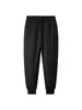 Yingao Calças Casuais Masculinas de Veludo Plus para o Inverno Calças de Moletom Quentes com Cordão Calças Masculinas de Perna Reta Novo Estilo Cor Sólida Roupa Externa Calças Longas Tendência