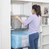 Bestseller transfronterizo: Bolsa de almacenamiento para edredones de gran capacidad, bolsa de almacenamiento de ropa plegable y engrosada, bolsa de embalaje para mudanzas de tela no tejida