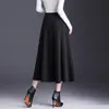 Saia Midi de Caxemira Sarjada Linha A Feminina Outono/Inverno 2026 Nova Cintura Alta Emagrecedora Elegante Versátil Barra Larga
