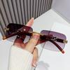 Europa y Estados Unidos nuevas gafas de sol sin montura de leopardo moda de alta gama transfronteriza gafas de sol para hombre y mujer gafas de sol para conducir al aire libre