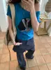 Estilo Nuevo de Verano Retro Holgado Estampado de Personajes Hombros Descubiertos con Hombro Diagonal Mangas Cortas y Camiseta de Letras