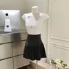 1.0 Falda Plisada de Cintura Alta con Lazo, Pliegues Ultrafinos, un Estilo Versátil y Clásico