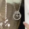 Collar de lazo guirnalda de piedra lunar de imitación para mujer, nicho ins de lujo ligero, temperamento dulce, cadena para la clavícula, regalo de Año Nuevo
