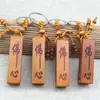 Serie de Artefactos Taoístas Personalizados Hacha de Madera de Durazno Espada de Madera de Durazno Llavero de Madera de Durazno Run Jianghu Artesanía Caliente de Madera de Durazno