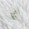 Pendientes de botón de aleación de titanio F136 color dorado con hoja de colores, piercing de labio/lengua de titanio G23 con rosca interna, joyería para la cabeza