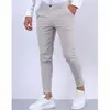 Novas Calças Sociais Masculinas de Cor Sólida Texturizadas Casuais Slim Fit Afuniladas para Todas as Estações - Estilo Europeu e Americano