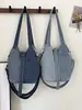 Bolso cuadrado pequeño de moda para mujer, nuevo modelo primavera-verano 2026, diseño de nicho, alto valor estético, elegante bolso cruzado y de hombro para el día a día