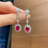 Europa y Estados Unidos populares en vivo color caliente tesoro color tesoro simulación micro incrustación pequeños frescos aretes aretes piedra principal 6*8