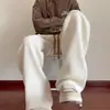 Calças casuais de veludo cotelê masculinas 2024 primavera e outono novo estilo americano calças esportivas largas soltas textura senso calças retas