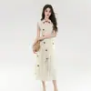 Colección 2026 de alta calidad: un vestido chic, que ciñe la cintura, de patchwork con un diseño único, que encarna la esencia del estilo chino moderno