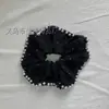 Venta caliente anillo de pelo de intestino grueso grande de verano estilo coreano gasa piel de bebé estrella diamantes de imitación perla cara pequeño temperamento coleta banda de goma