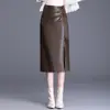Falda midi con abertura irregular para mujer, nueva otoño/invierno 2026, falda de cuero PU de cintura alta adelgazante, elegante y simple, moderna