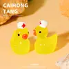 Resina estéreo pato luminoso gorro de enfermera pato DIY pasador joyería coche escritorio adornos pequeños accesorios material