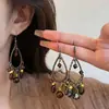 Brincos de Gancho com Pingente de Pedra Padrão de Água Flor Redonda Gota d'Água de Bambu Estilo Étnico Retrô Brincos de Design de Nicho para Mulheres