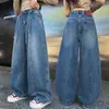 Jeans curvos de ajuste holgado estilo retro americano para niñas, nuevo modelo primavera y otoño 2026, pantalones al por mayor transfronterizos para niños mayores