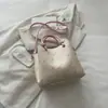 Bolsa Tote Tendência Transfronteiriça para Mulheres 2026 Novo Modelo Bolsa de Mão de Grande Capacidade para o Dia a Dia Bolsa de Ombro com um Toque Casual Elegante Bolsa de Axila para Mulheres