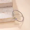 Anillos apilables de acero inoxidable transfronterizos nuevos, cuentas redondas, anillos abiertos de flor de cáñamo finos, fabricantes de joyería de mano de acero de titanio moderna y simple