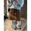 Falda de Pana Estilo Nuevo de Otoño Mocci Retro Francés de Botonadura Única de Cintura Alta Adelgazante Línea A MQ1740