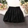 Falda Bute de Flor Negra Pequeña para Mujer Verano Versátil Cintura Alta Adelgazante Línea A Plisada Voluminosa Ropa Exterior