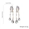 Pendientes de plata con incrustaciones de diamante en forma de gota de agua, aretes stud simples, modernos, exquisitos, sensación de lujo ligero, alta gama, accesorios para pendientes, sentido del diseño, nicho