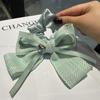 Diadema con lazo para mujer 2023, nueva cinta para la cabeza con nicho que combina con todo, accesorios para el cabello estilo Chanel, entrega en vivo