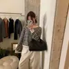 Mezcla de lana y pelo de conejo, alta calidad, ¡en stock! Colección de otoño 2026: un suéter de punto relajado, a rayas y que estiliza