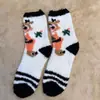 Calcetines de Navidad de coral de otoño e invierno, calcetines de suelo cálidos para el hogar de terciopelo medio, calcetines de Navidad de Papá Noel
