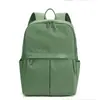 Mochila de viaje, para ir al trabajo y para la escuela de diseño minimalista, tela de nailon, impermeable, versátil, moderna, mochila para mujer de estilo simple